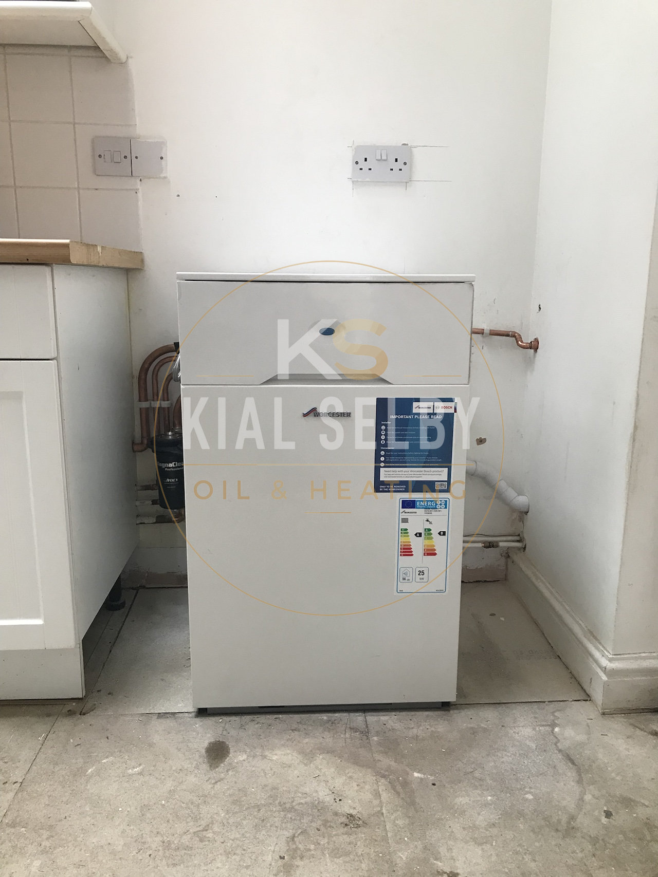 Internal Worcester oil boiler installation under worktop